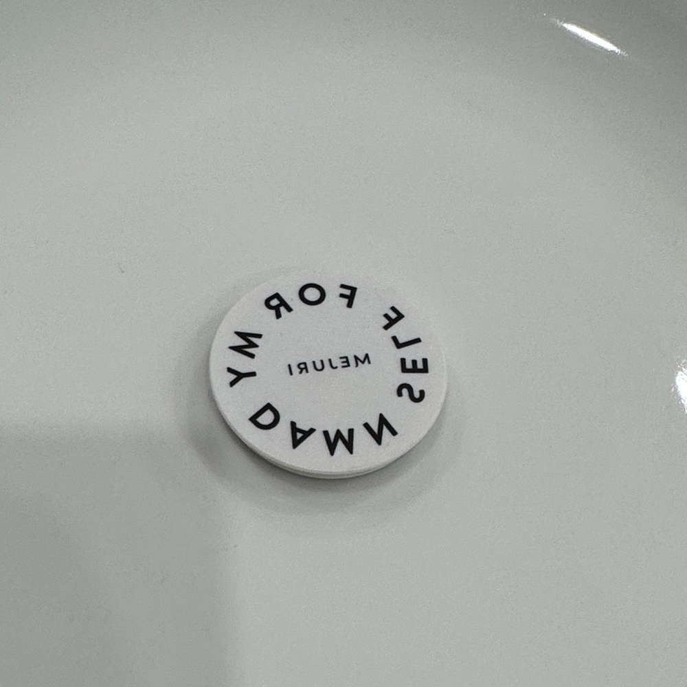 Mejuri pop socket, in mirror says “for my damn self”